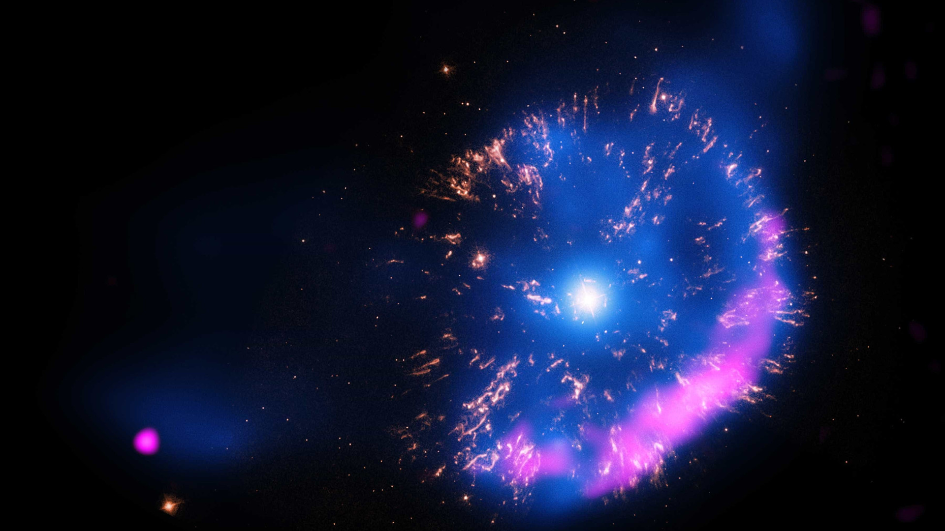 Galáxia espiral aparece rodeando estrelas famosas