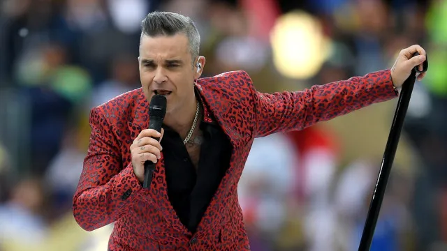 
                    Robbie Williams retorna ao Brasil e quer mostrar que é o 'mestre do entretenimento'
                
