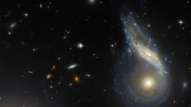 Hubble revela duas galáxias em processo de colisão